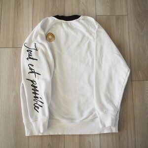 Cirque du Soleil White Sweatshirt “Tout est possible” Sleeve Gold Logo sz M